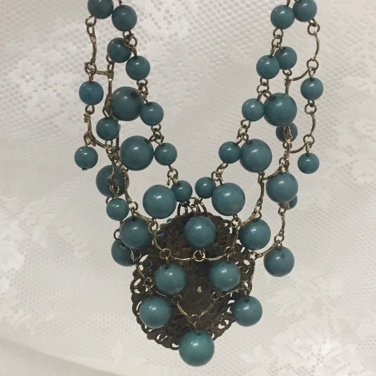 Handcrafted Spirit Doll Face Necklace: Creepy Art Jewelry