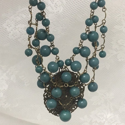 Handcrafted Spirit Doll Face Necklace: Creepy Art Jewelry